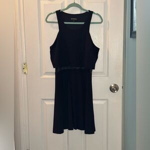 Black Express dress. Mesh detailing at waist. Size large.